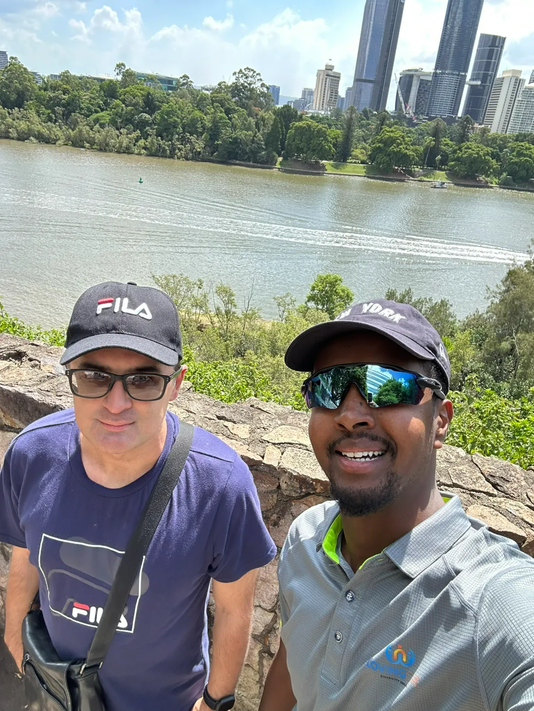 A Loving Care support worker and participant enjoying an outing overlooking Brisbane