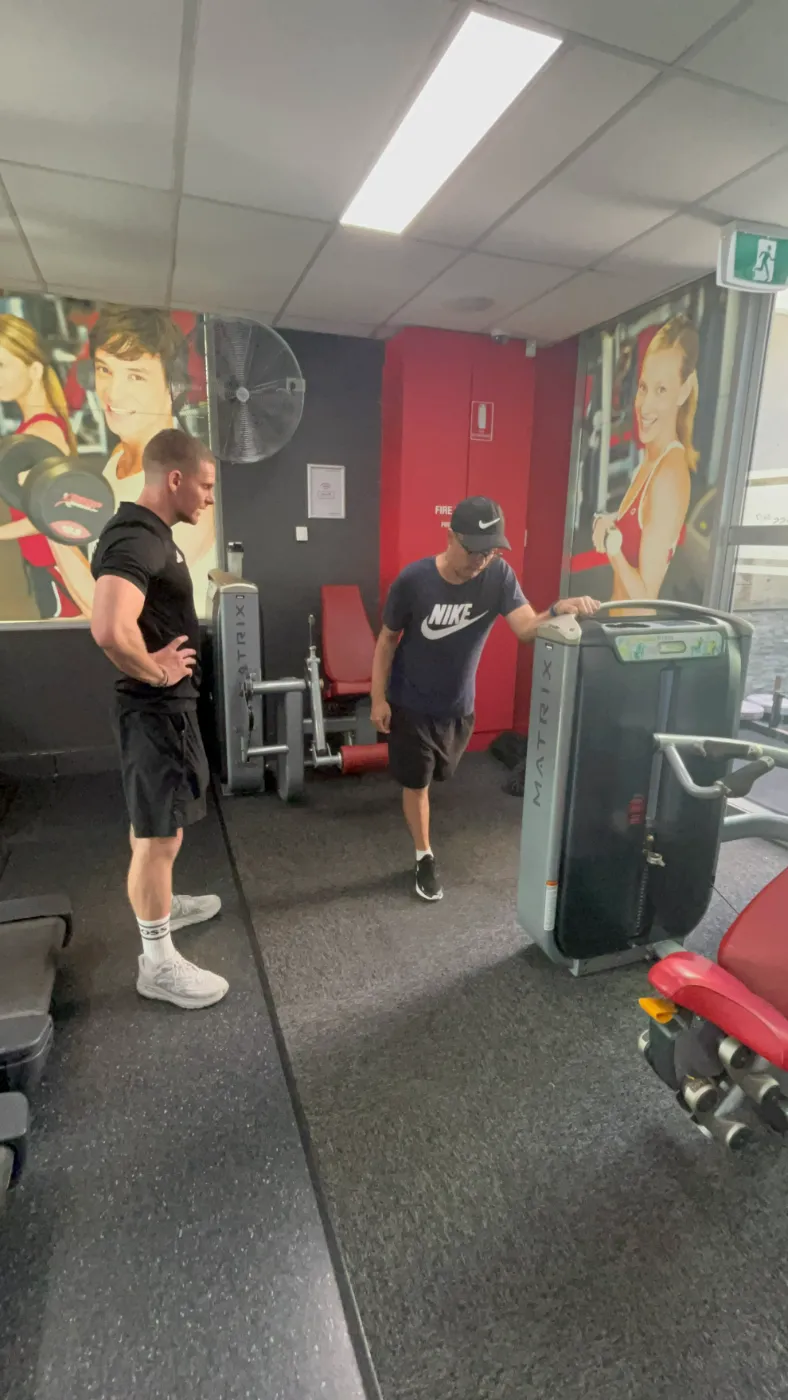A participant completing a guided exercise at the gym