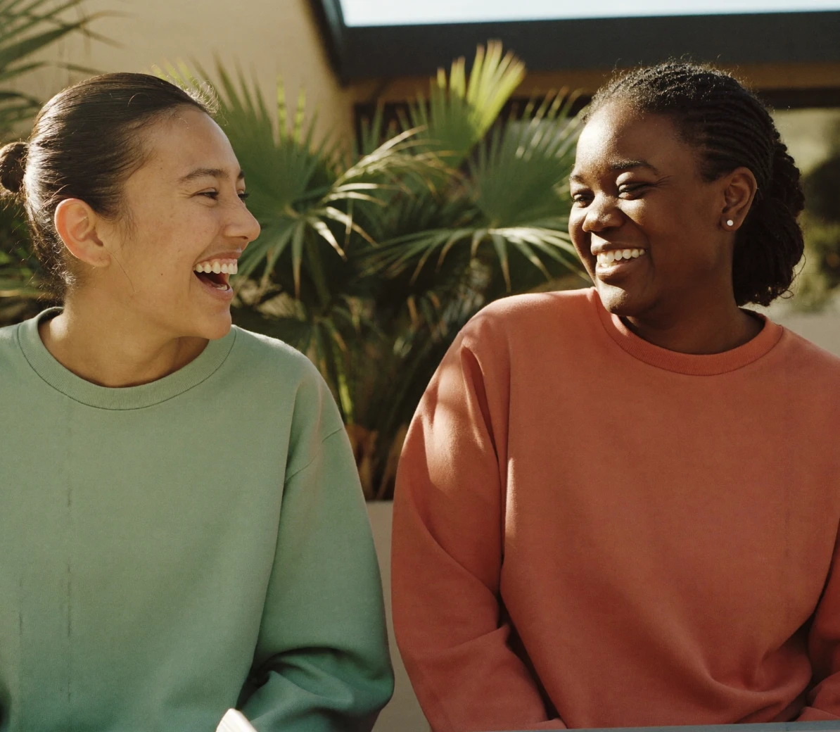 Two people sharing a relaxed conversation